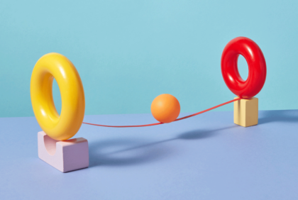 photo of 2 circles with a string between them showing a ball balancing